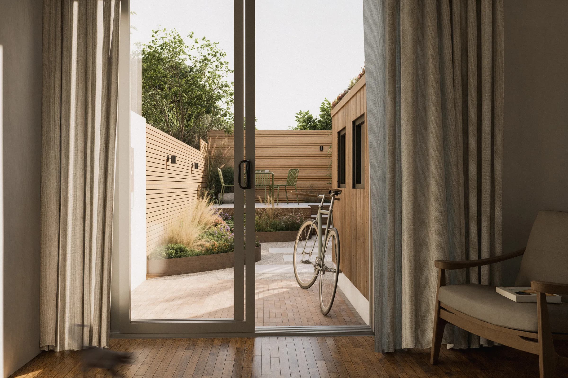 ECH WORKS — Overview of the completed garden with seating and lush planting.